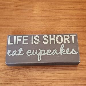 Gray and White Decorative Sign